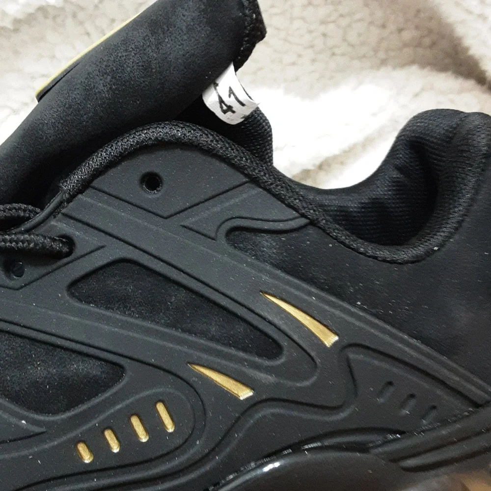 Women 's Black Athletic Chunky Sneakers with Gold Accents